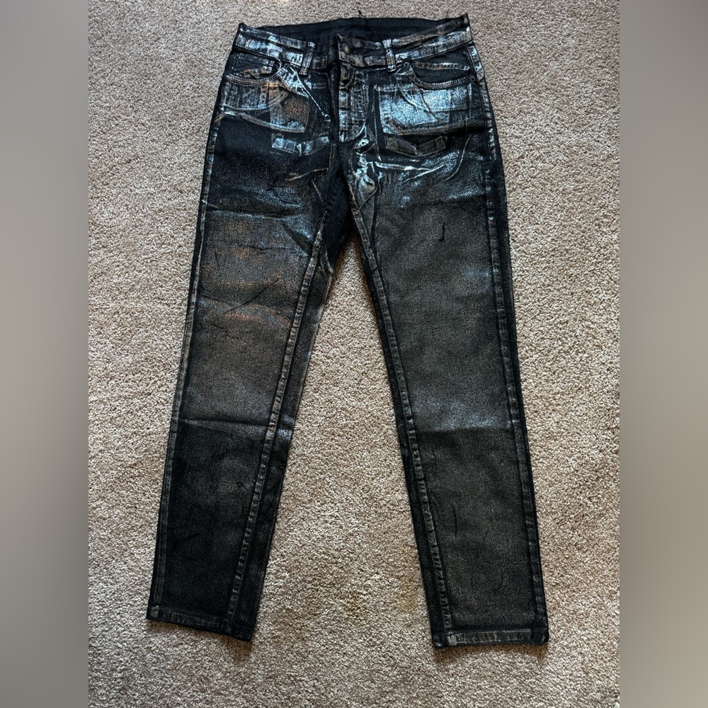 Woman’s Black Jeans Silver washed on front. Size L